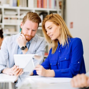 demo-attachment-307-business-people-in-office-5HLCX4S-1