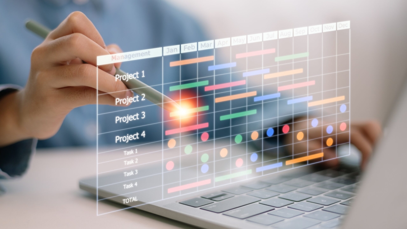 The,Project,Manager,Works,And,Updates,Tasks,With,Milestones,And